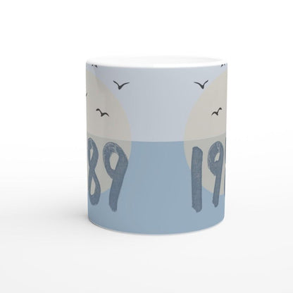 Ceramic coffee mug with blue bird design inspired by Taylor Swift