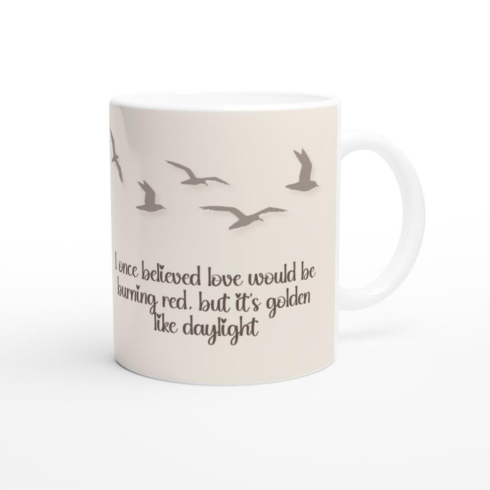 Golden ceramic mug featuring Taylor Swift Daylight lyrics