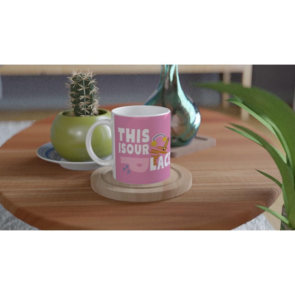 Pink ceramic coffee mug with Fearless and Speak Now Taylor Swift designs