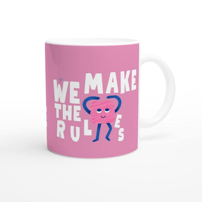 Pink ceramic coffee mug with Fearless and Speak Now Taylor Swift designs