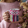 Customizable gingham mug with Taylor Swift album book spines