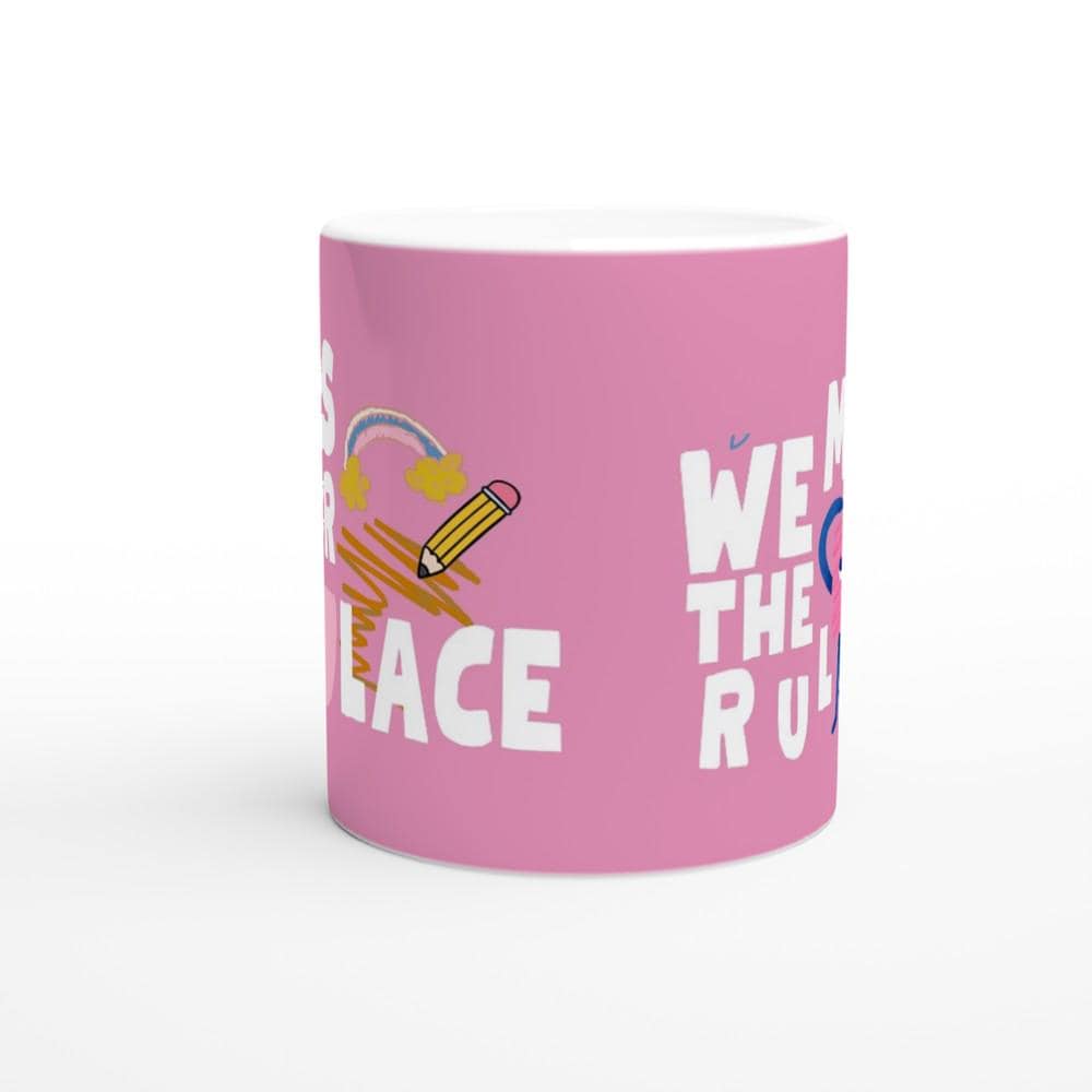 Pink ceramic coffee mug with Fearless and Speak Now Taylor Swift designs