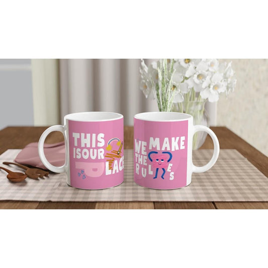 Pink ceramic coffee mug with Fearless and Speak Now Taylor Swift designs