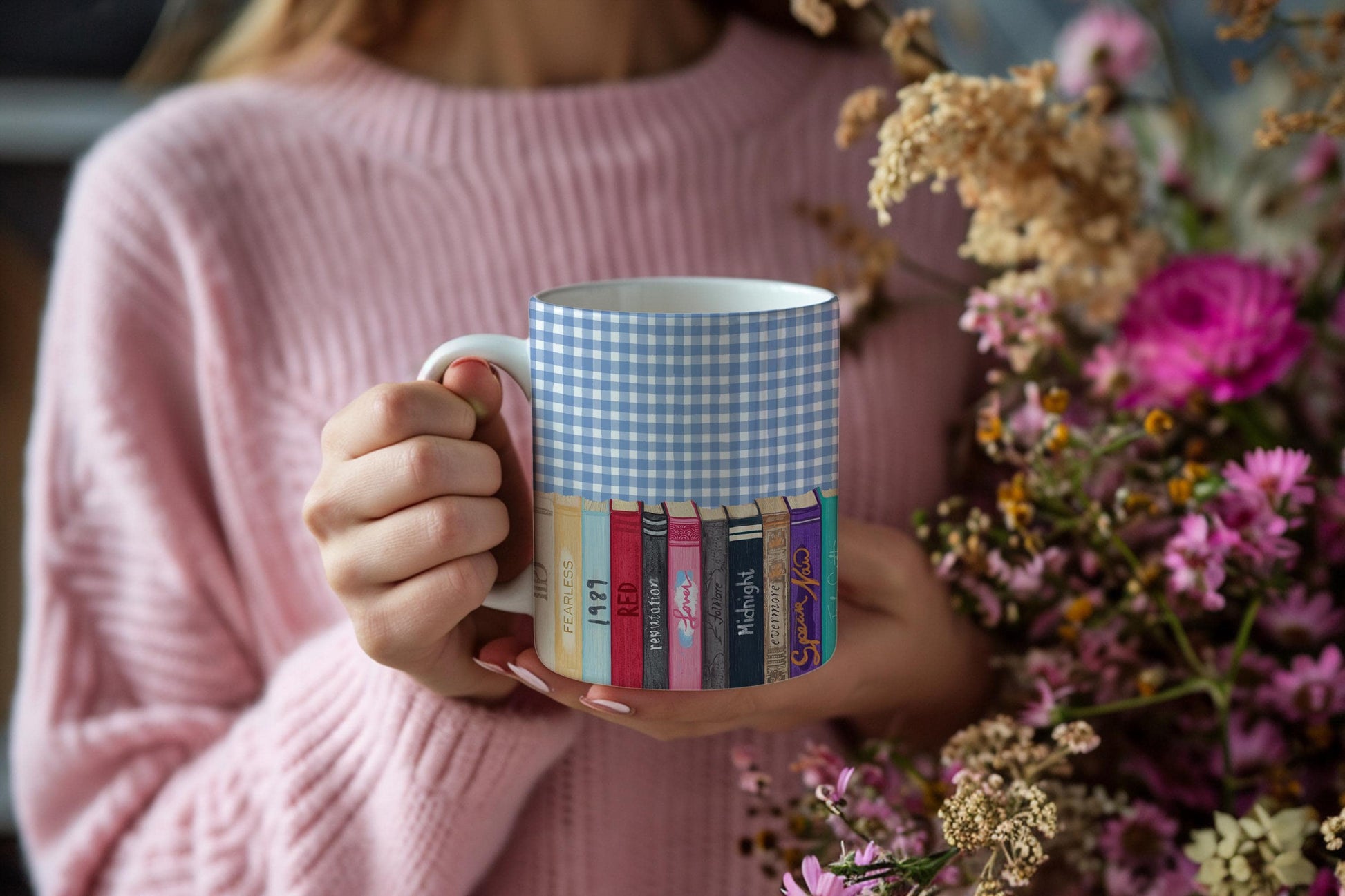 White ceramic mug with Taylor Swift albums as classic books design