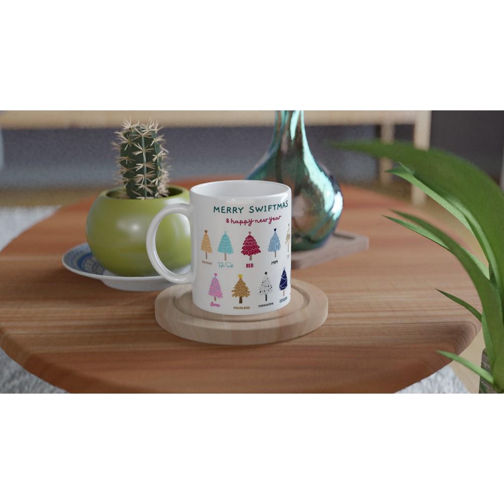 White ceramic mug with Merry Swiftmas holiday design for Taylor Swift fans