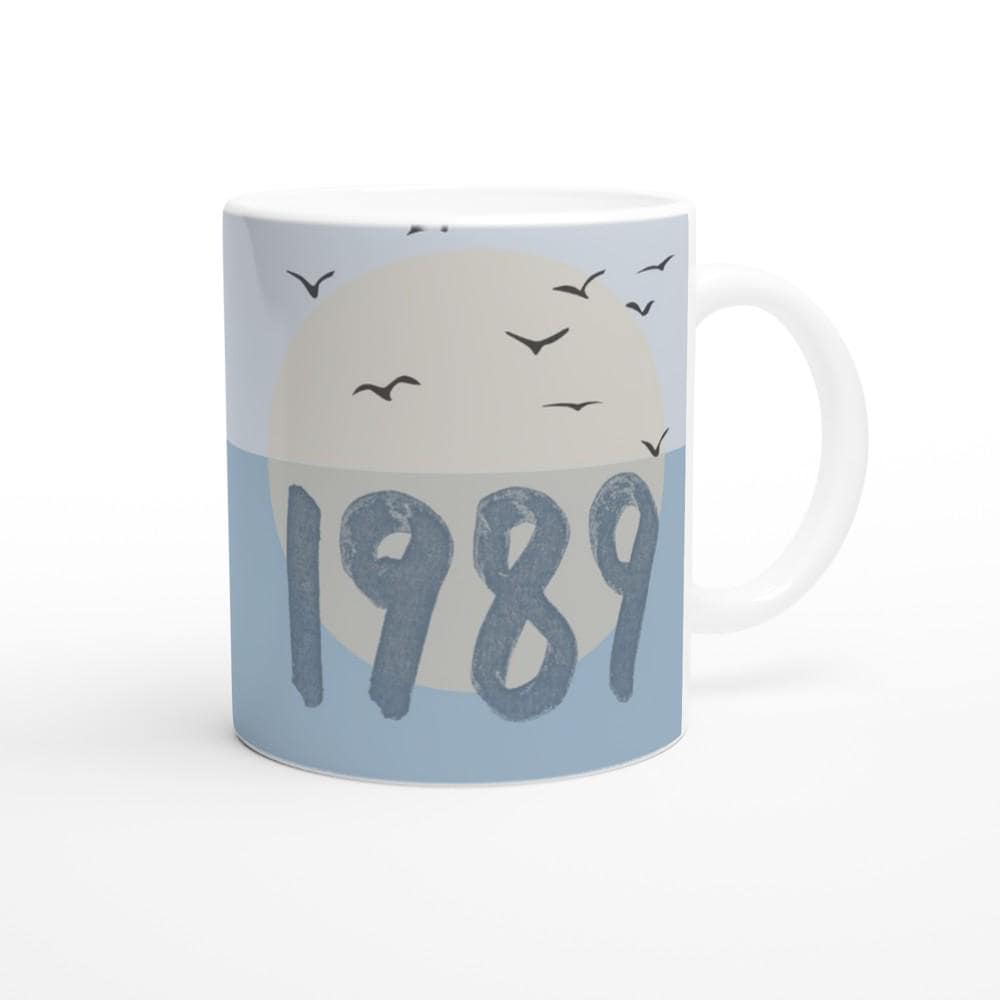 Ceramic coffee mug with blue bird design inspired by Taylor Swift