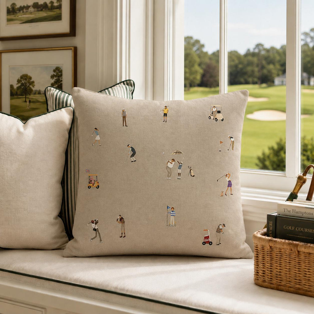 Natural beige golf pillow with illustrated tiny golfers