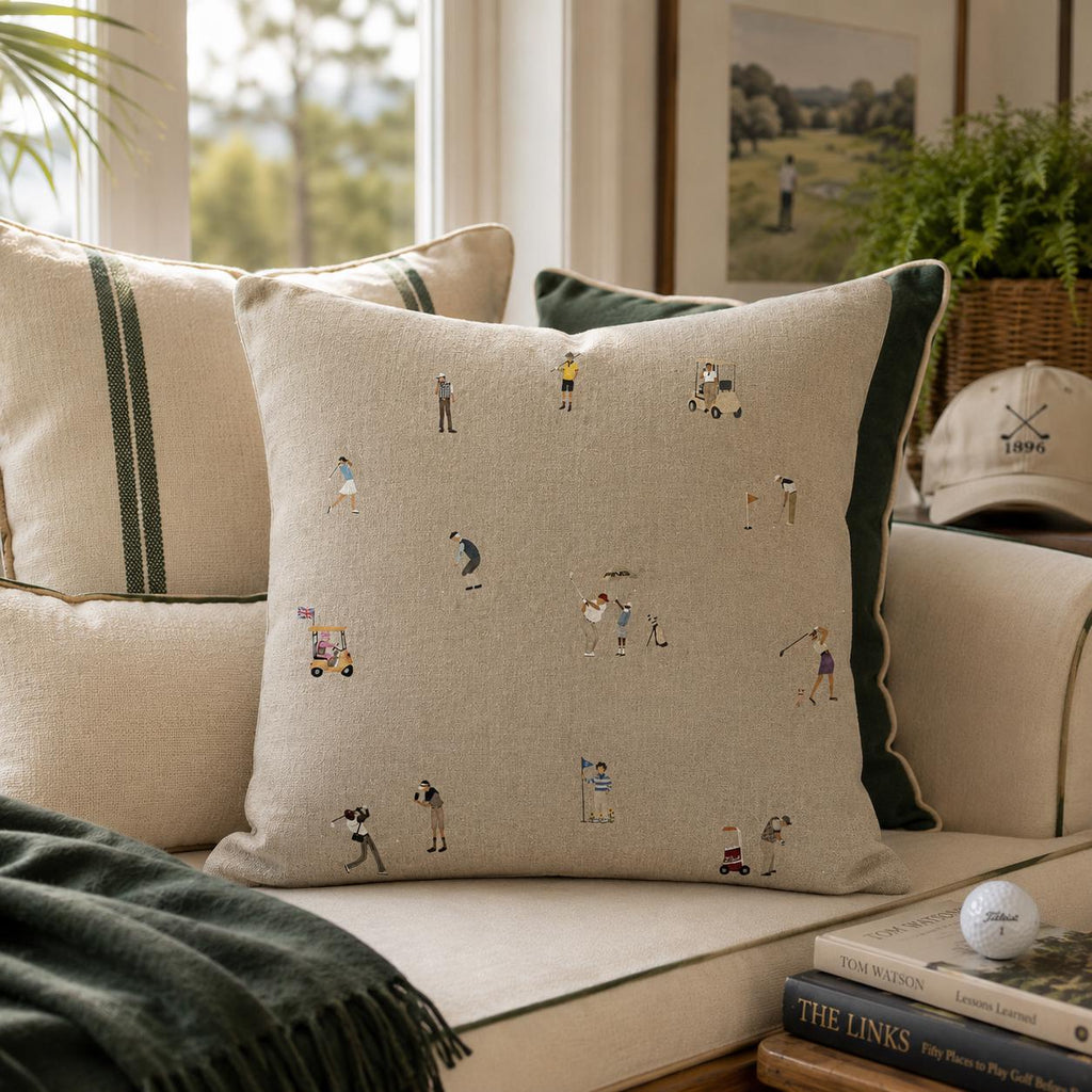Close view of tiny golfers on natural fabric