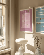 Pink Doubles Delight paired with blue swimming lanes art beside a sunlit window.