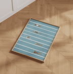 Swimming In Lanes V tall blue pool art print framed on a parquet floor.
