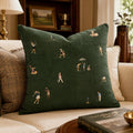 Dark green golf pillow with illustrated women golfers