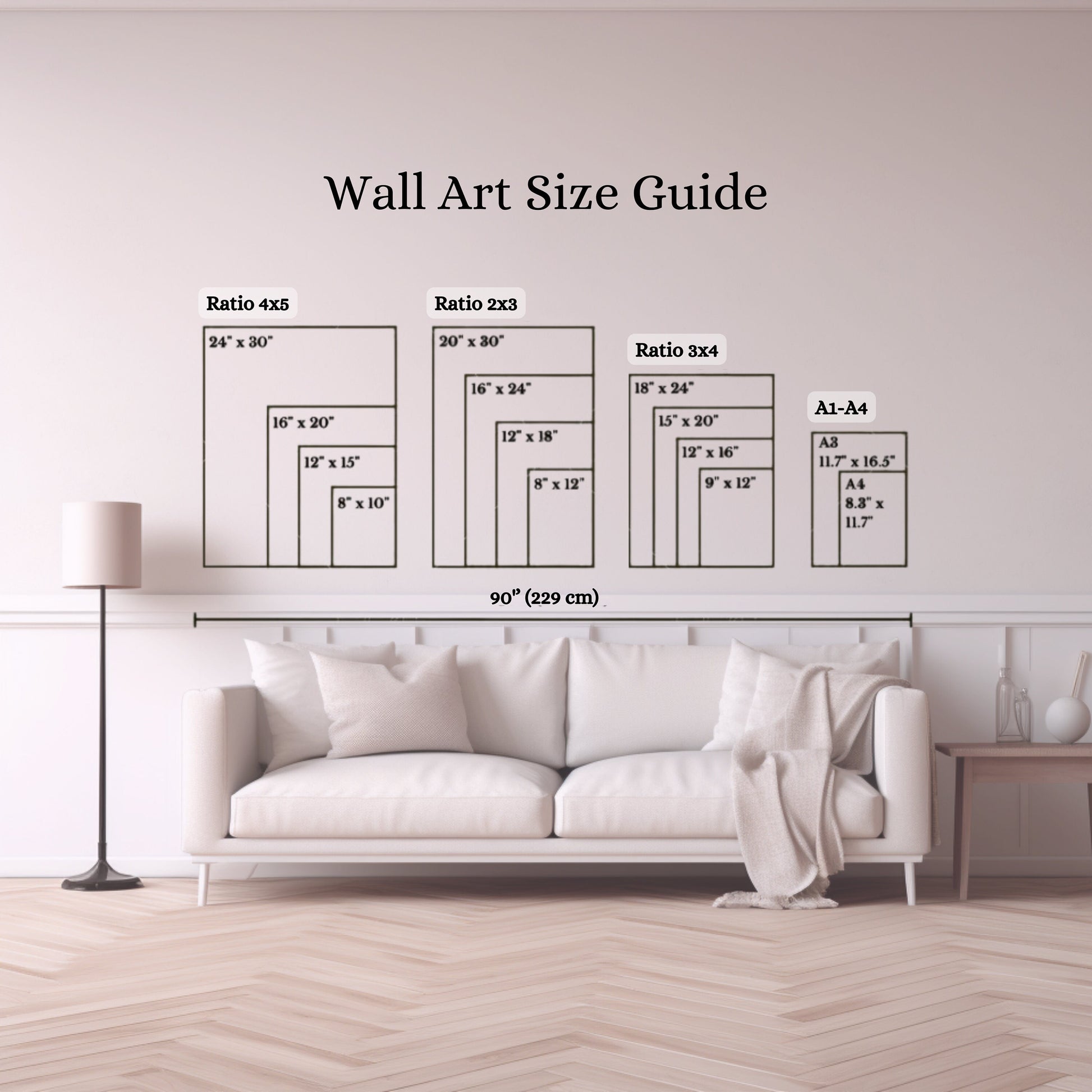 a living room with a white couch and a wall art size guide